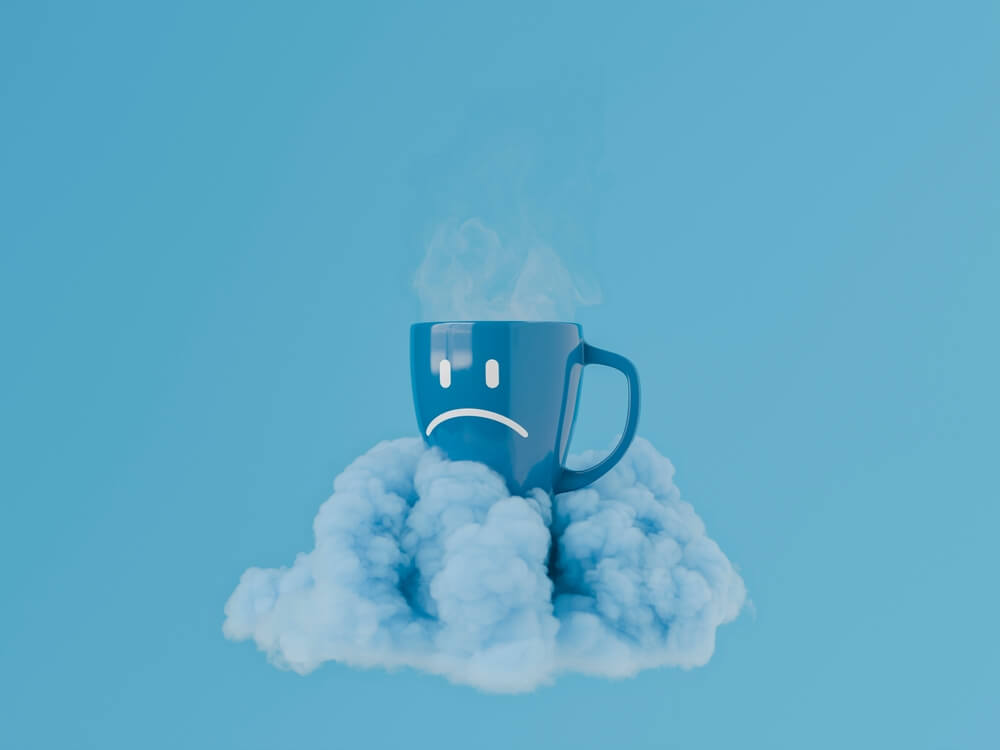 Tazza da caffè con faccina triste del blue monday